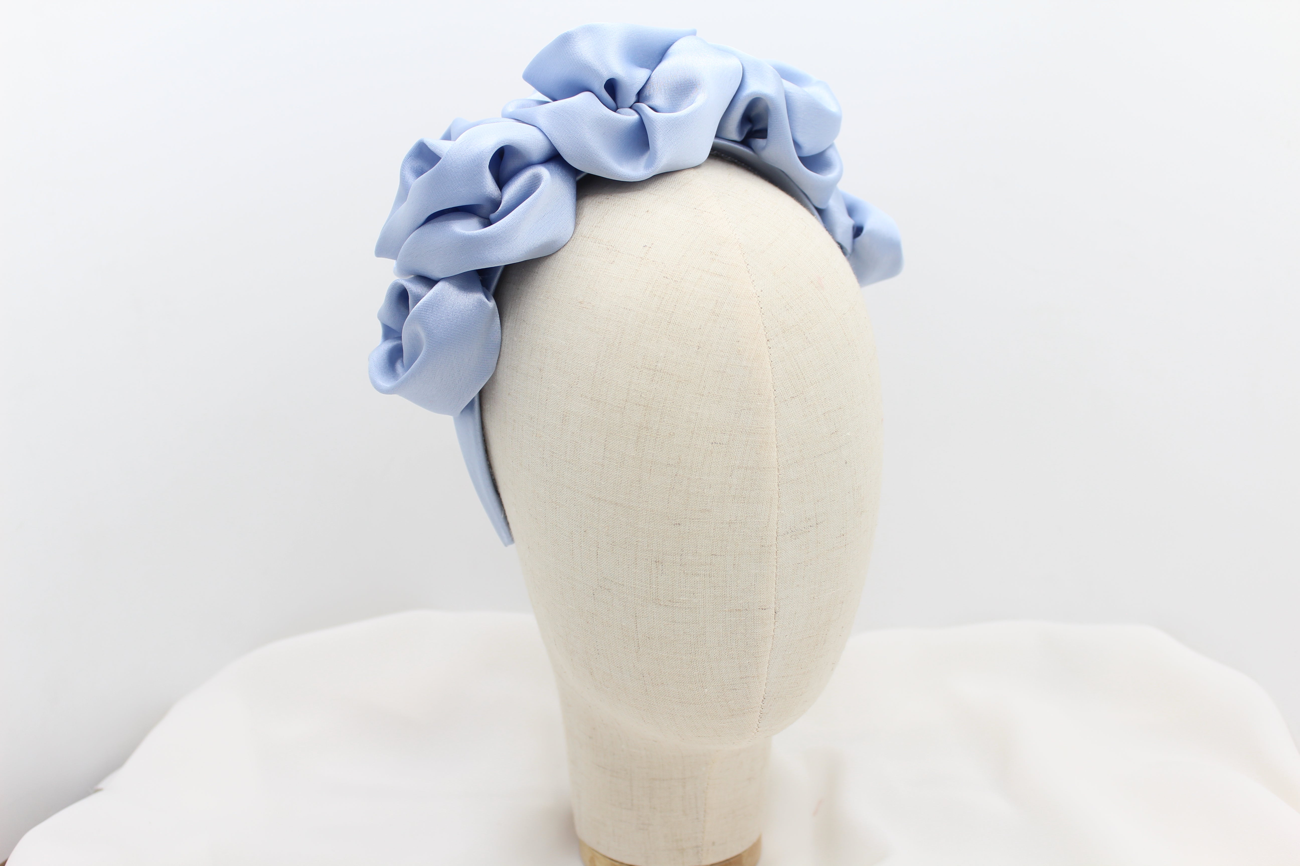Diadema flores satén - azul claro