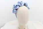 Cargar imagen en el visor de la galería, Diadema flores satén - azul claro
